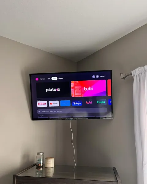 Corner-mounted TV in a living room